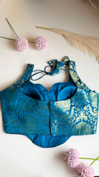 NEELIKA NAAZ peacock blue Banarasi brocade sleeveless blouse, back view