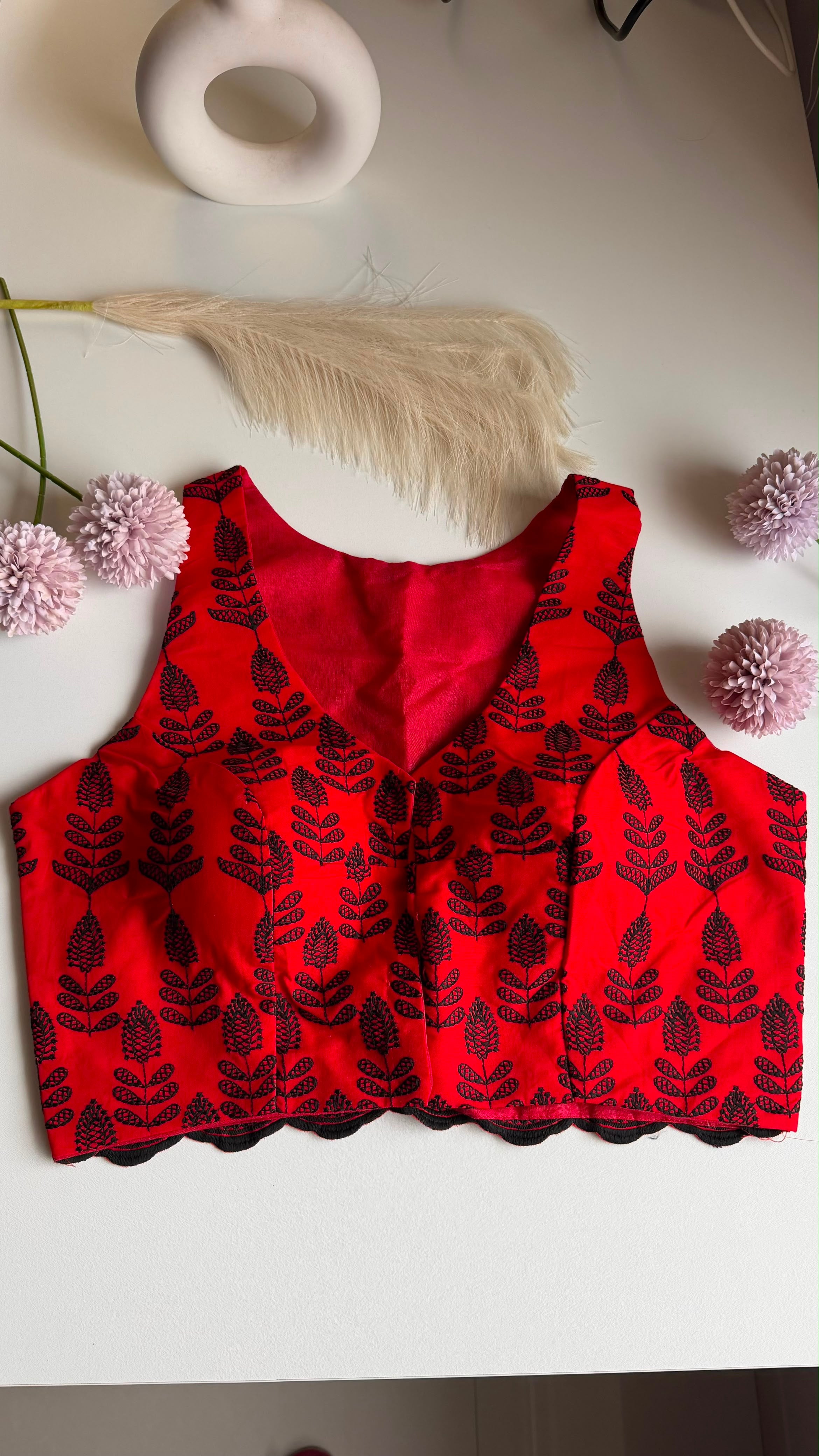 SINDOORI NOOR red and black printed padded sleeveless blouse, front view