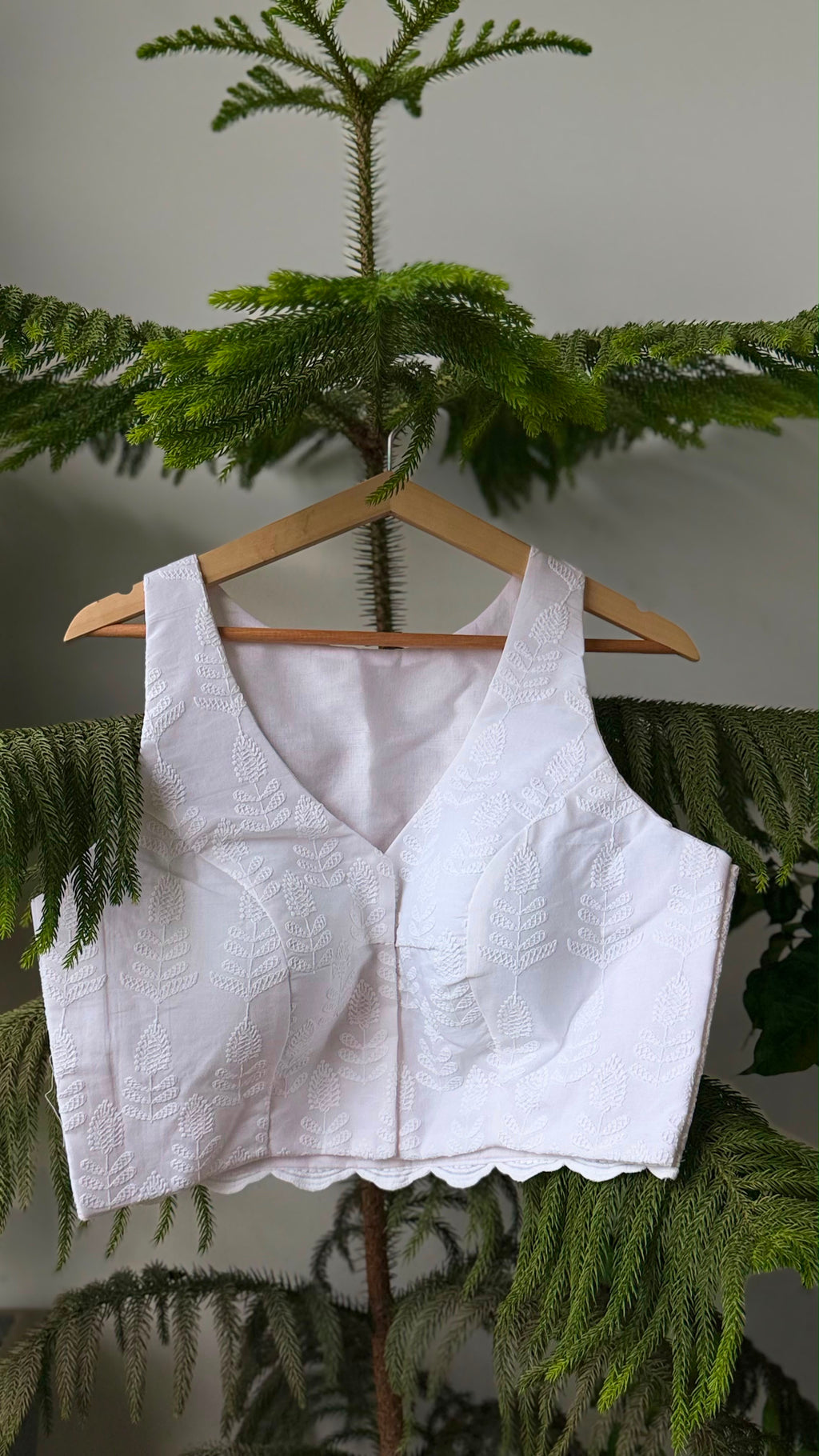CHAND NOOR white chikankari padded sleeveless blouse, side view