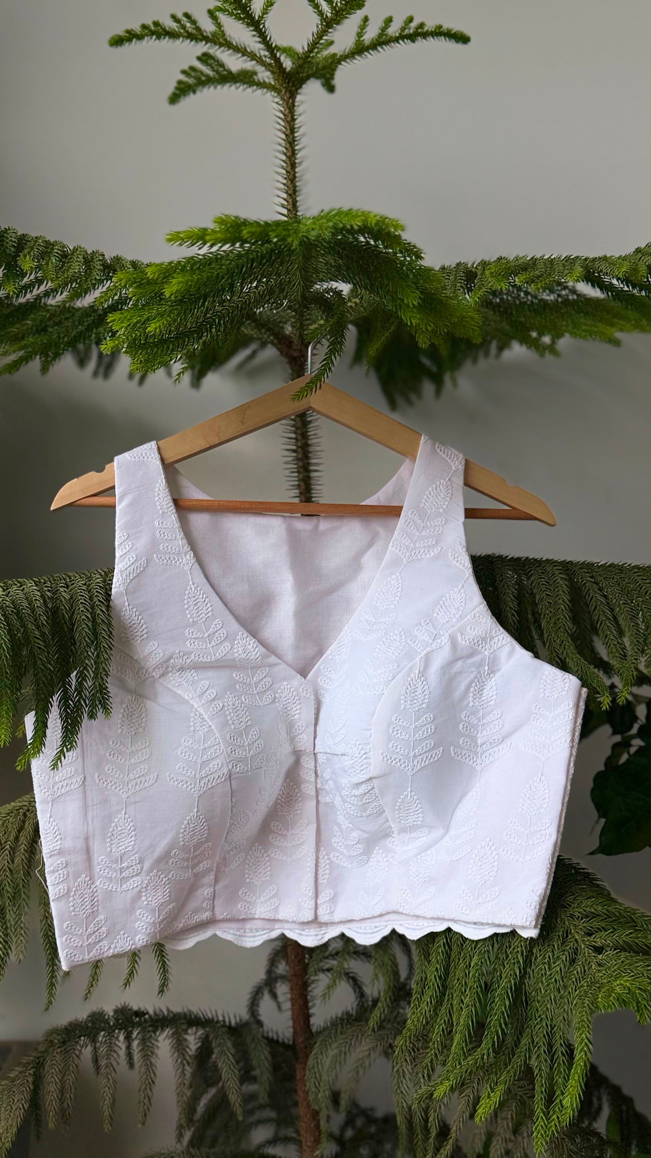 CHAND NOOR white chikankari padded sleeveless blouse, side view