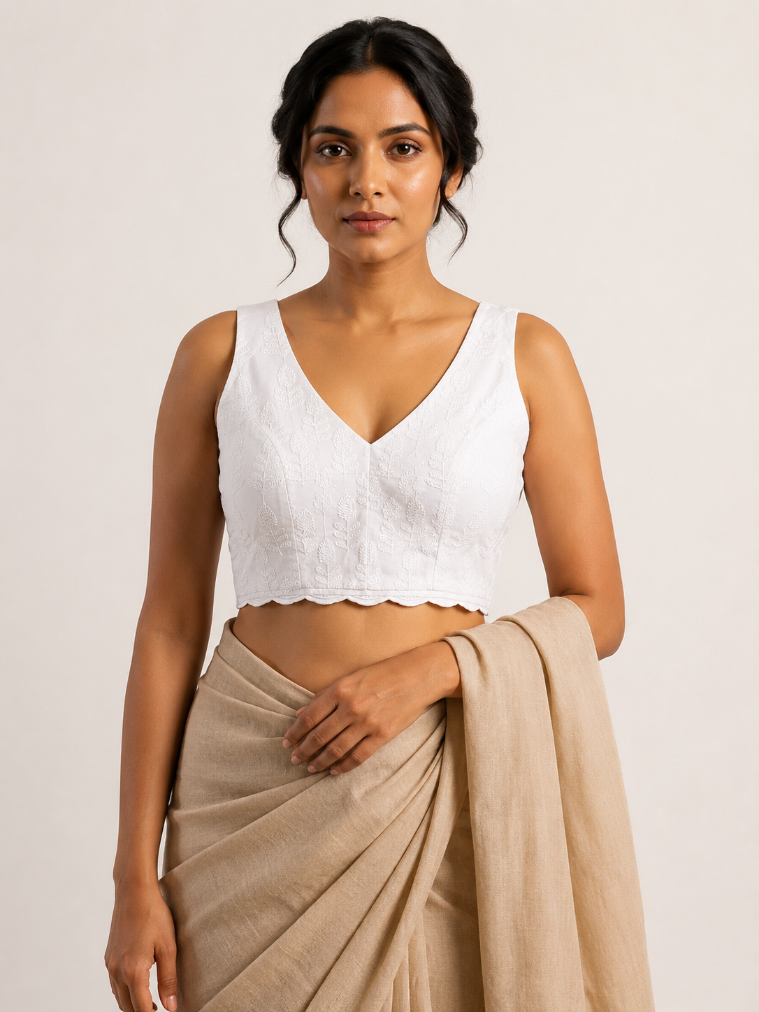 CHAND NOOR white chikankari sleeveless blouse, styled model view
