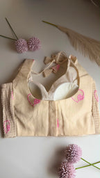 DILRUBA ivory heart-embroidered stretchable sleeveless blouse, back view