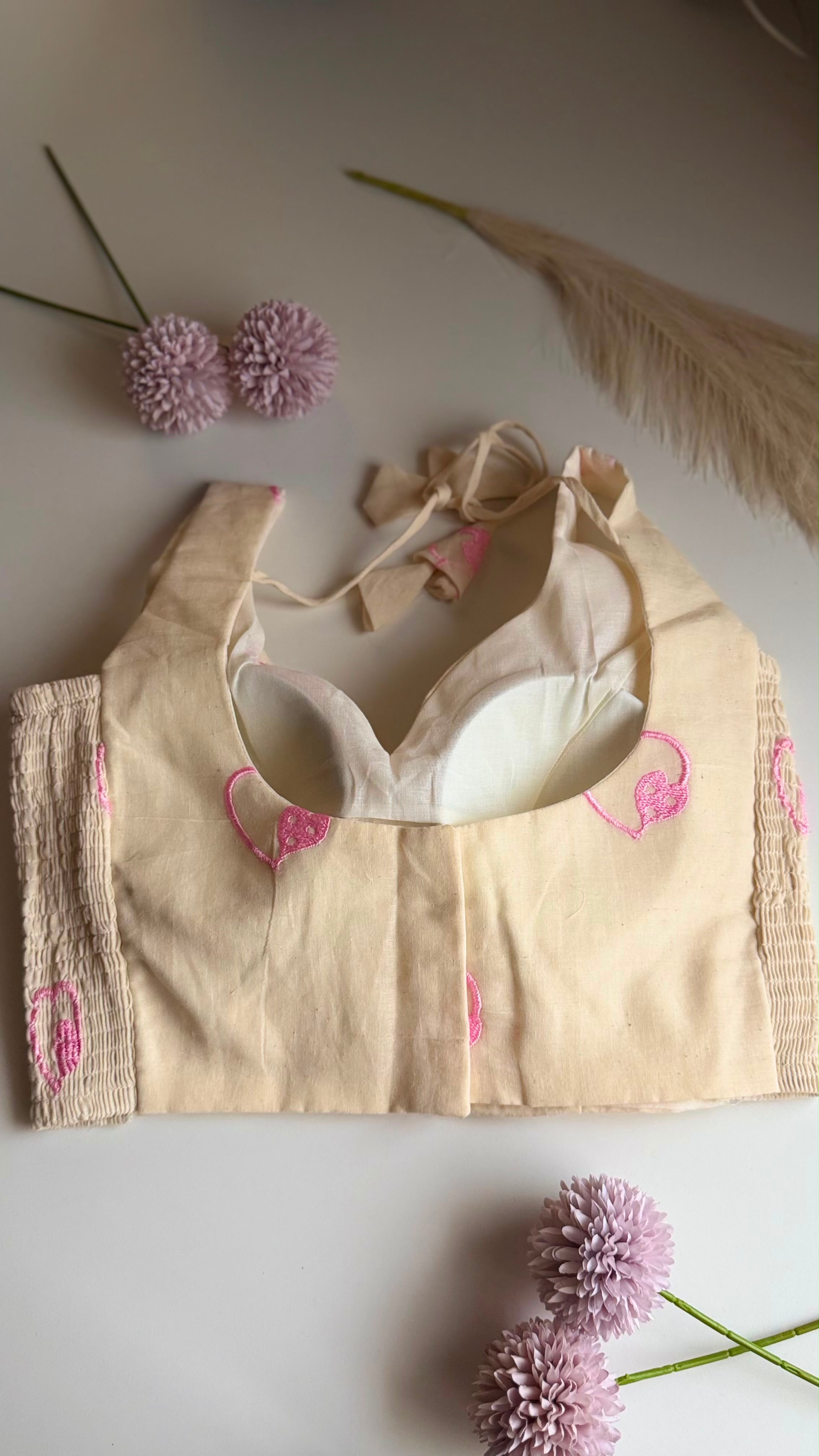 DILRUBA ivory heart-embroidered stretchable sleeveless blouse, back view